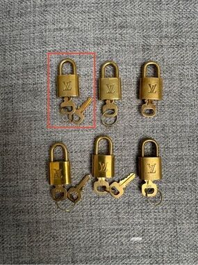#325 Louis Vuitton Gold Padlock with Keys